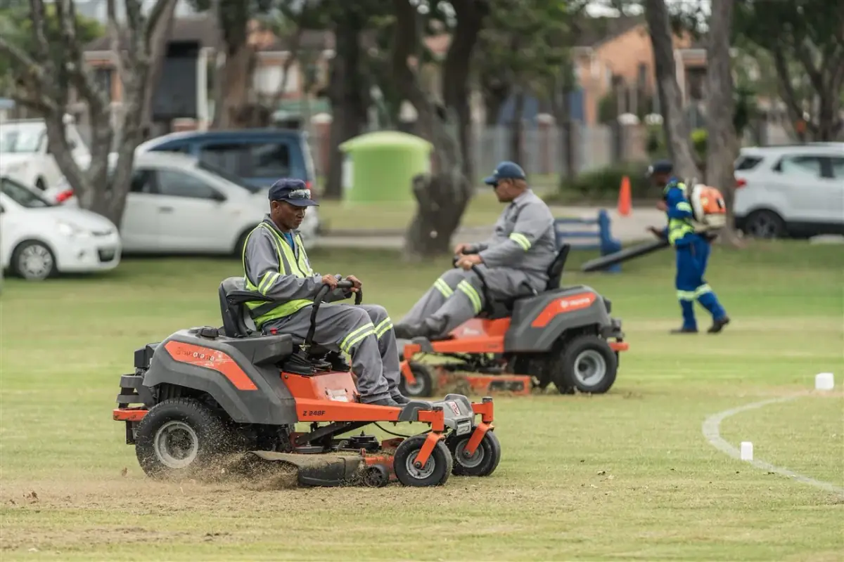 Lawnworx ride-on mowing team maintaining a large grassed area